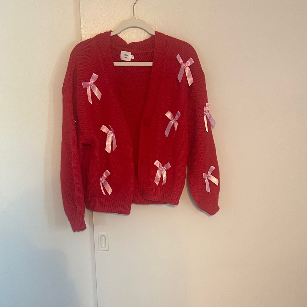 Elegant Red Cardigan with Pink Ribbon Details